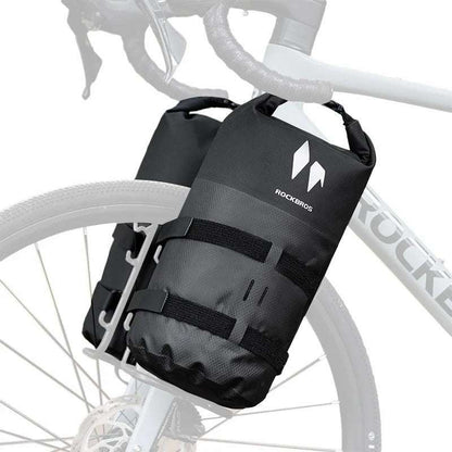 ROCKBROS fork rack bag mounted on bicycle, black roll-top with front straps and logo