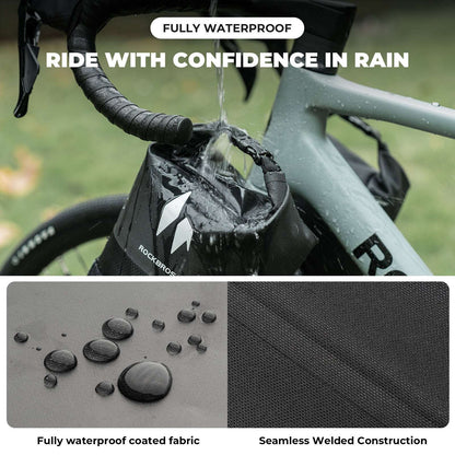 ROCKBROS waterproof front fork rack bag, black roll-top with logo, shown in rain