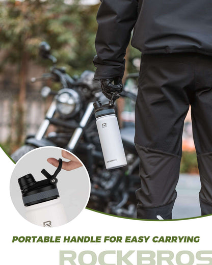 White stainless steel water bottle with portable carry handle attached near the rider