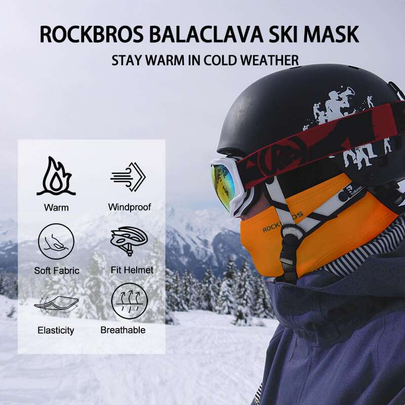 Black and orange balaclava ski mask covering face and neck, helmet-ready style.
