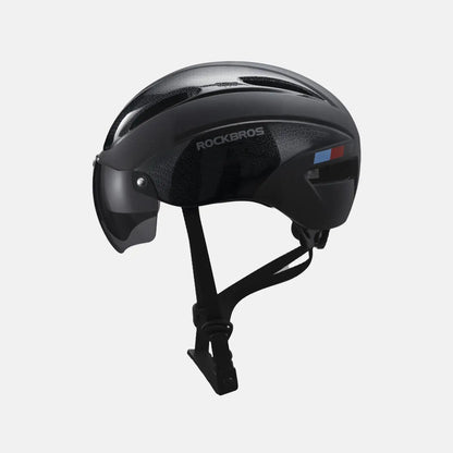 Black bike helmet with vented shell and adjustable chin strap