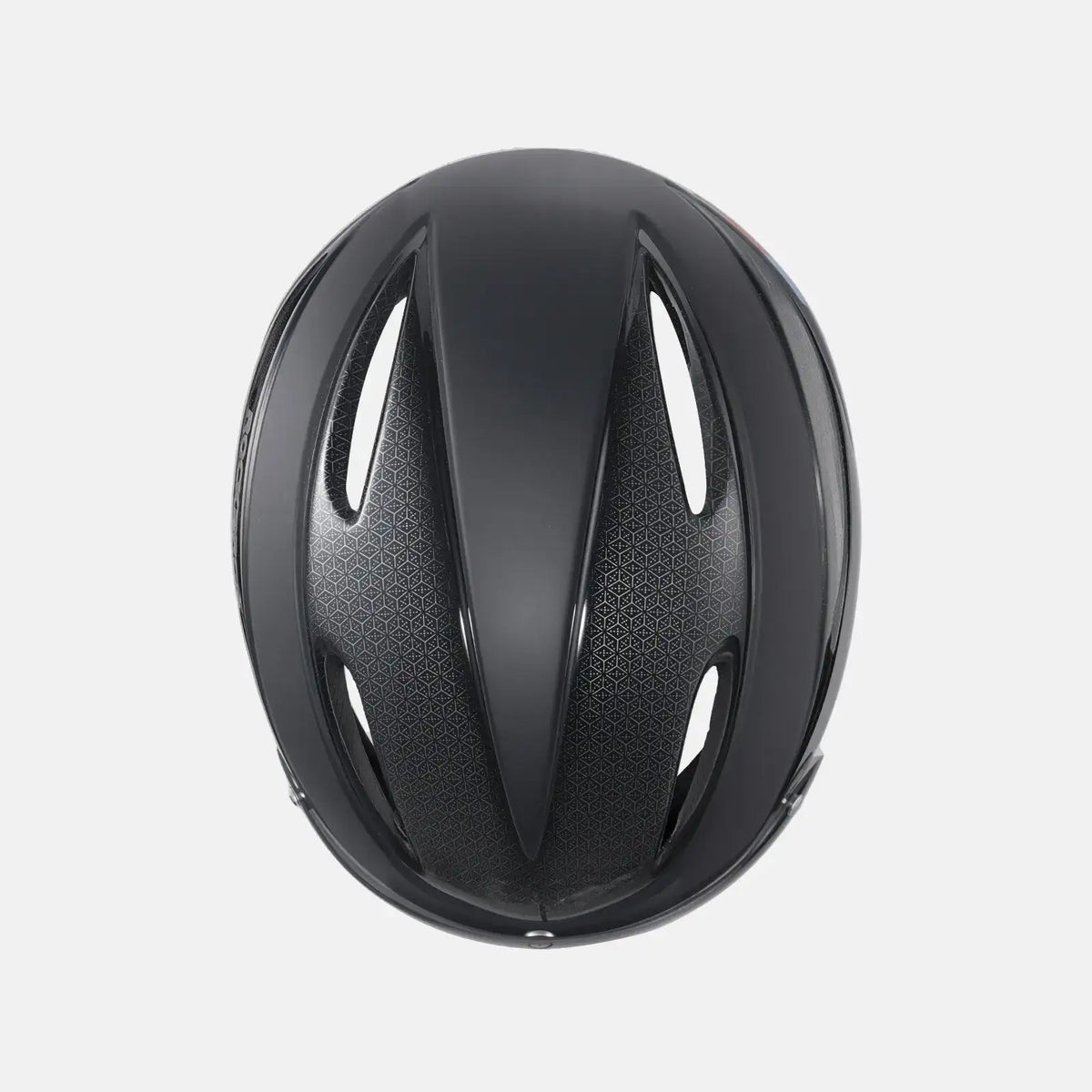 Black bike helmet with oval ventilation channels on the top