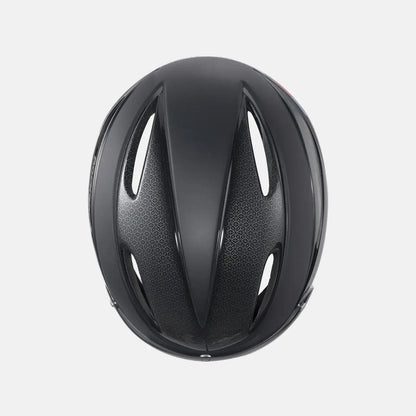 Black bike helmet with oval ventilation channels on the top