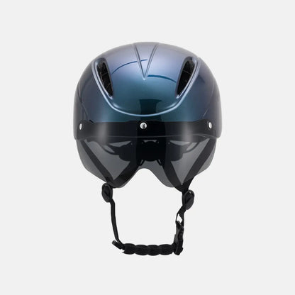Blue bike helmet with integrated dark visor, rear vent holes, chin strap