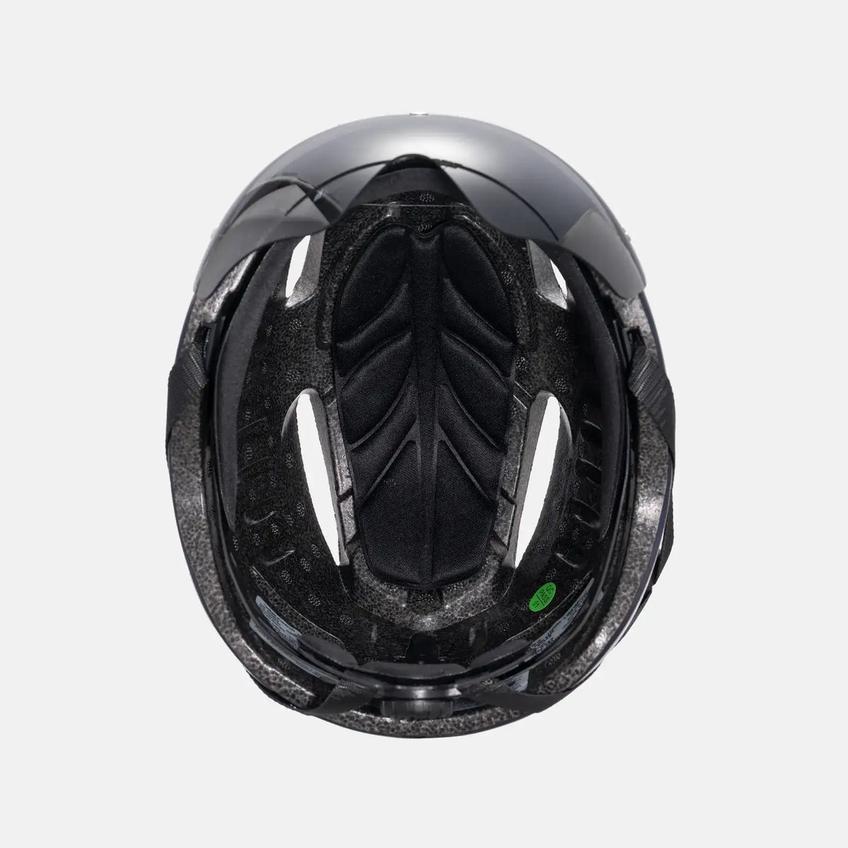 Bike helmet interior with black padding and protective lining, top opening visible