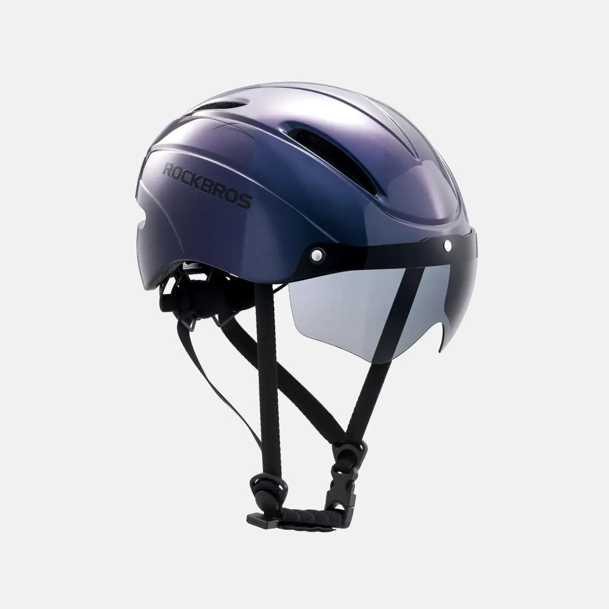 Purple-blue bike helmet with integrated clear visor, chin strap and rear vents