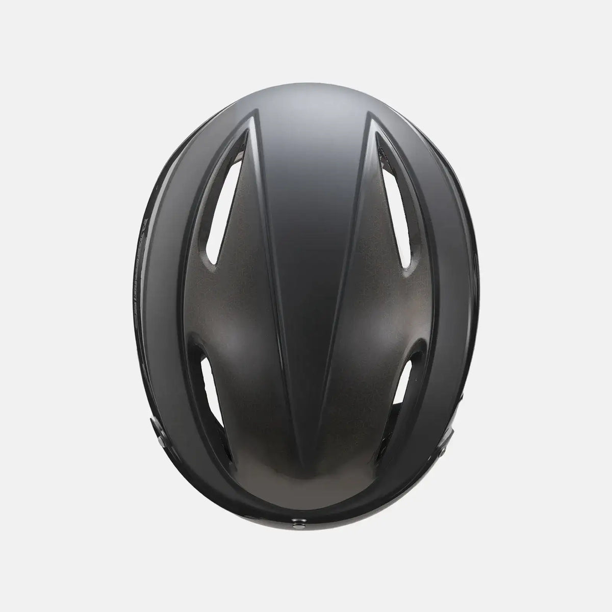 Bike helmet with glossy gray top shell, close-up top view with vent openings