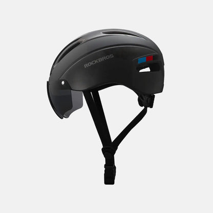 Bike helmet with glossy black shell and chin strap, side profile with ventilation cutouts