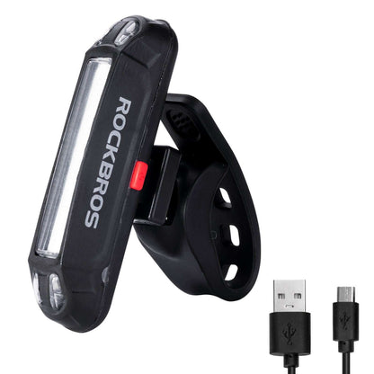 Rechargeable rear bike light with USB cable, black housing and red indicator strip