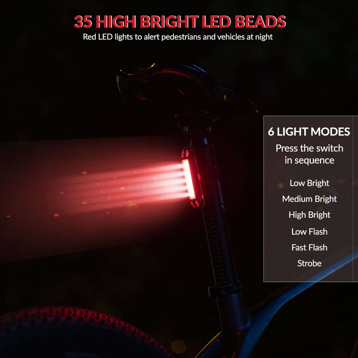 Rear bike taillight with bright red LED light bar in a dark setting