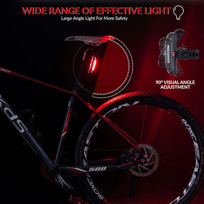 Rear bike taillight mounted on seatpost with wide red beam