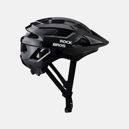 Black youth bike helmet shown from the side with vent openings and straps