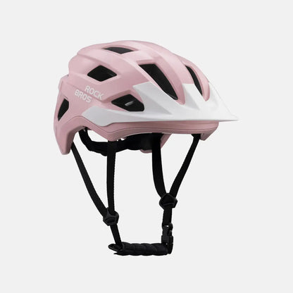Pink youth bike helmet side view with chin straps and vent channels