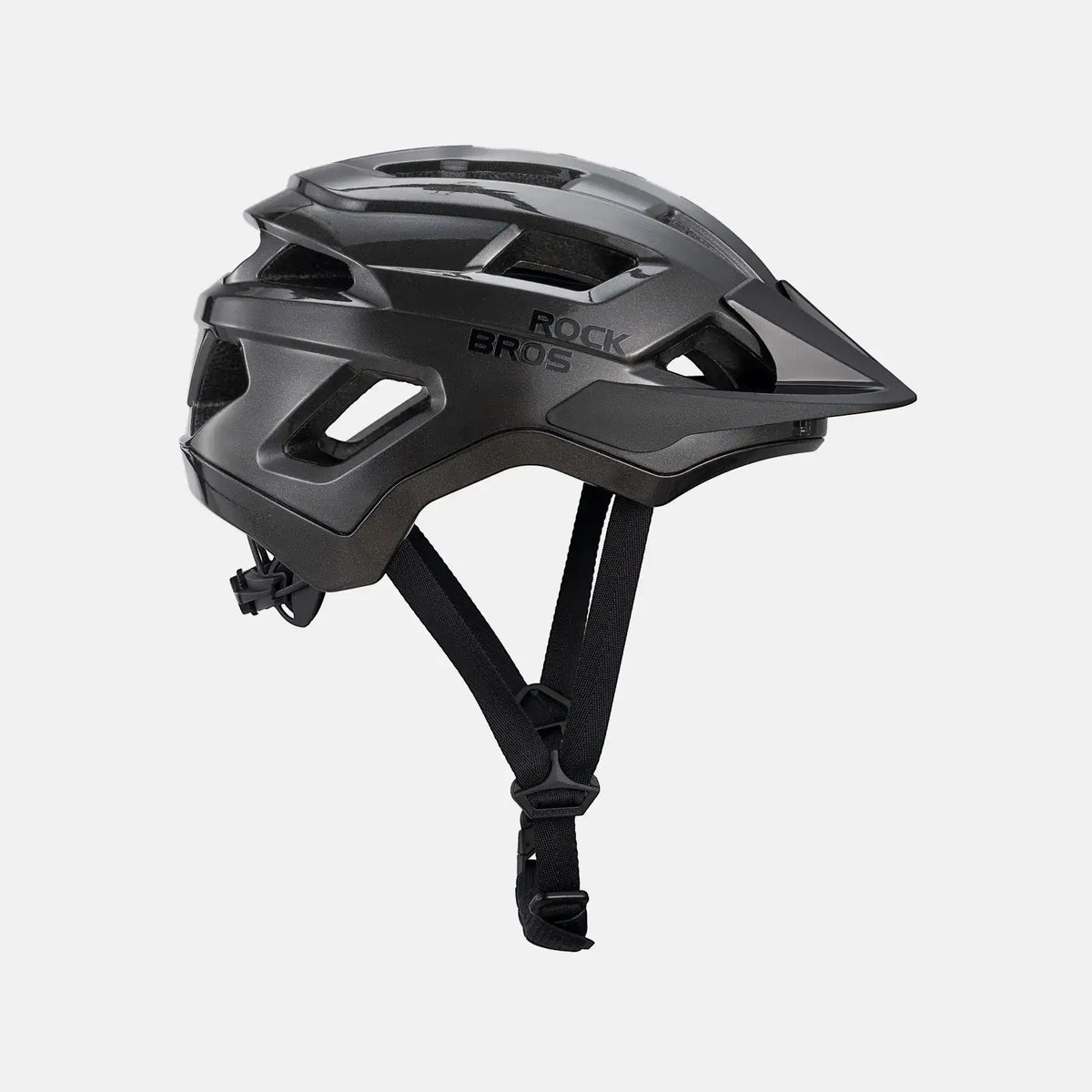 Youth bike helmet, black side profile with vents and chin strap adjuster