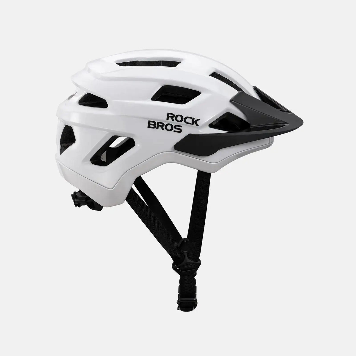 White youth bike helmet with black accents and vented shell, side view