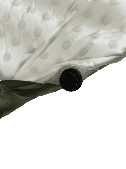 Self-inflating sleeping pad valve with black cap