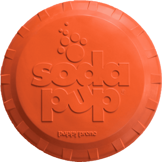 Orange rubber dog flyer frisbee with raised paw and SodaPup logo design, round shape.