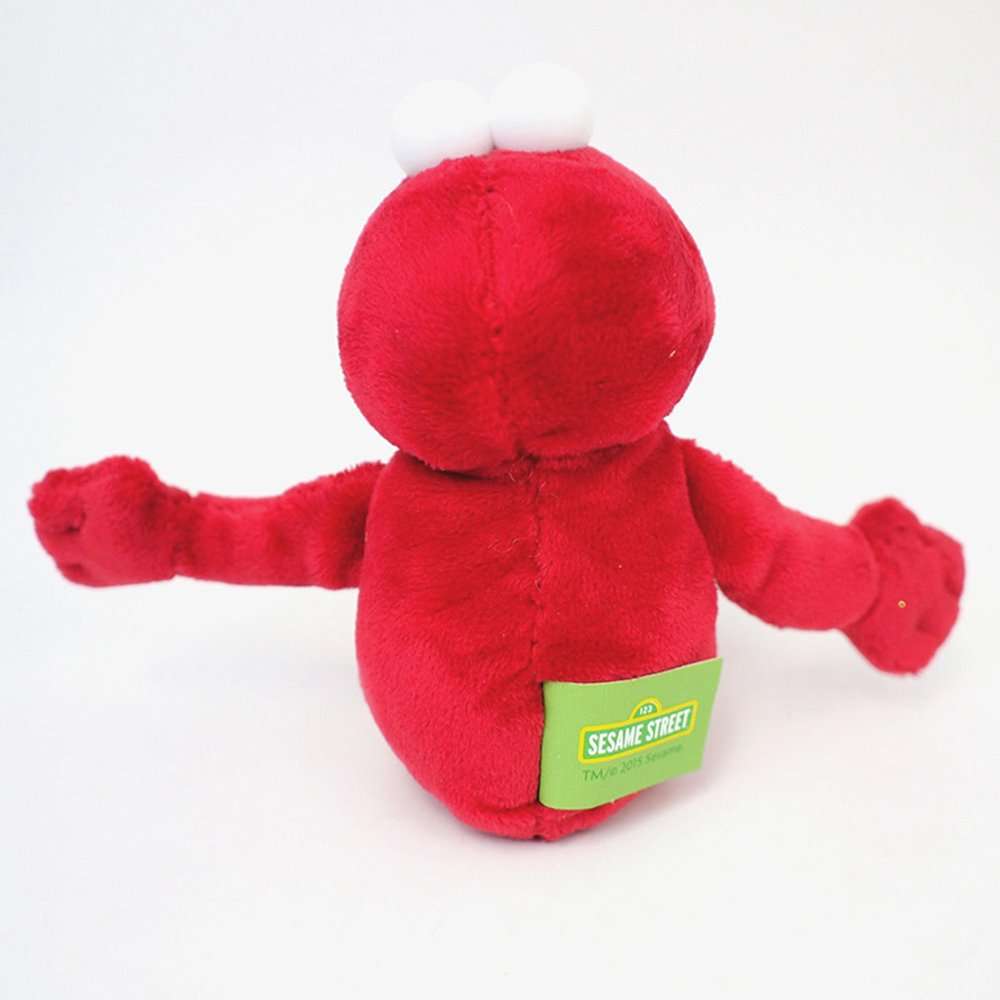 Back view of red Elmo plush beanbag toy with Sesame Street tag