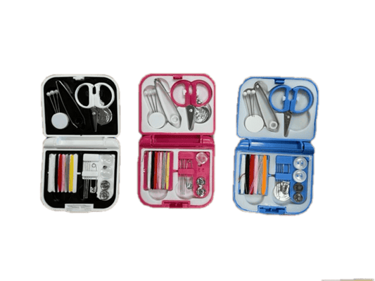 Blue travel sewing kit case with scissors, needles, thread spools and measuring tools