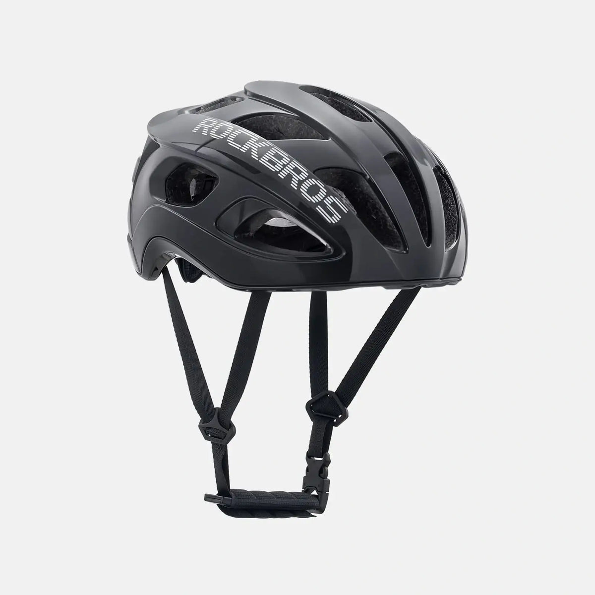 ROCKBROS lightweight bike helmet in black, front 3/4 view with chin straps