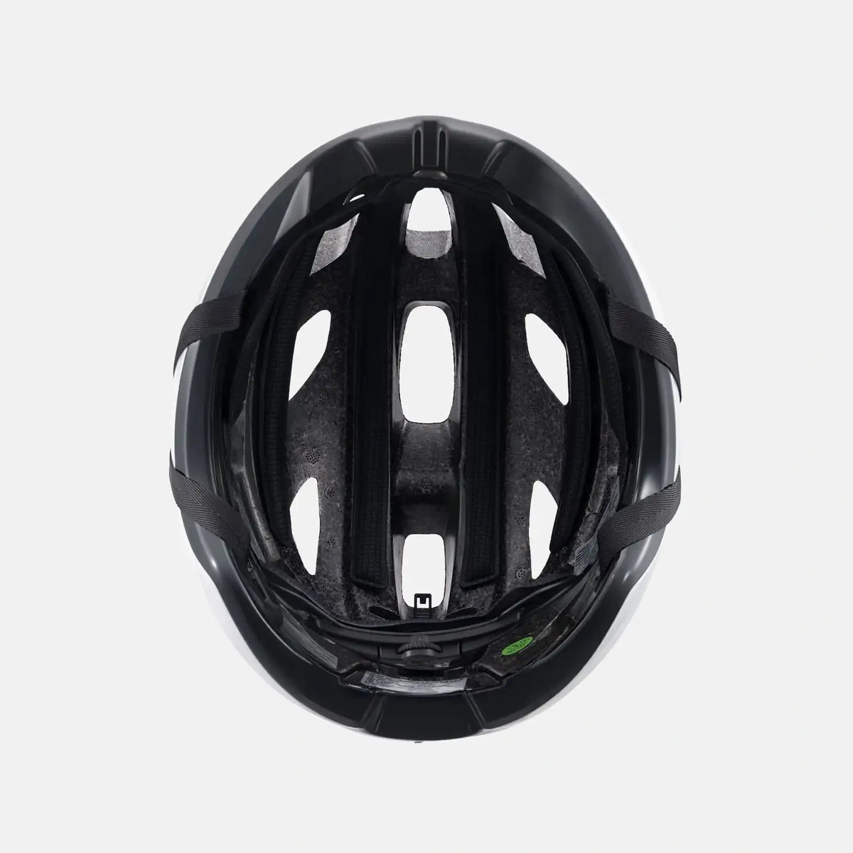 Lightweight bike helmet in matte black with interior vent channels and padding