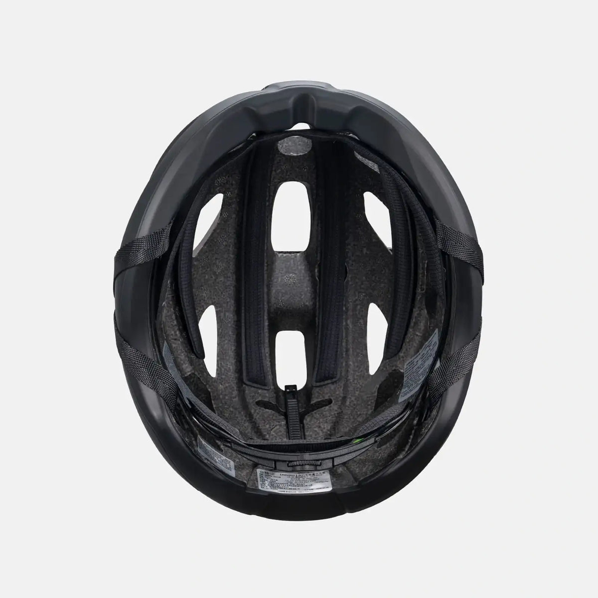 Lightweight bike helmet in matte black, underside view showing inner padding and channels