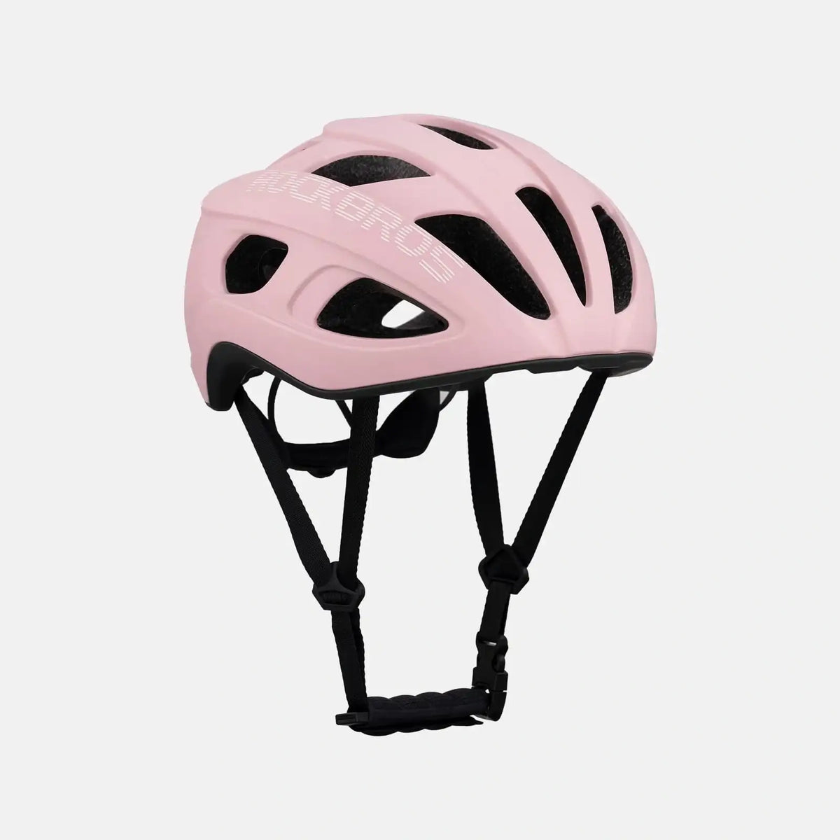 Pink bike helmet top view with multiple vents and black chin strap