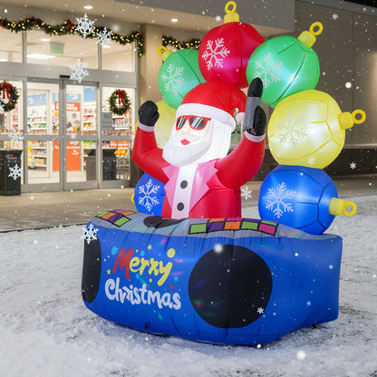 Inflatable DJ Santa with red suit, light-up ornaments, and blue Merry Christmas base