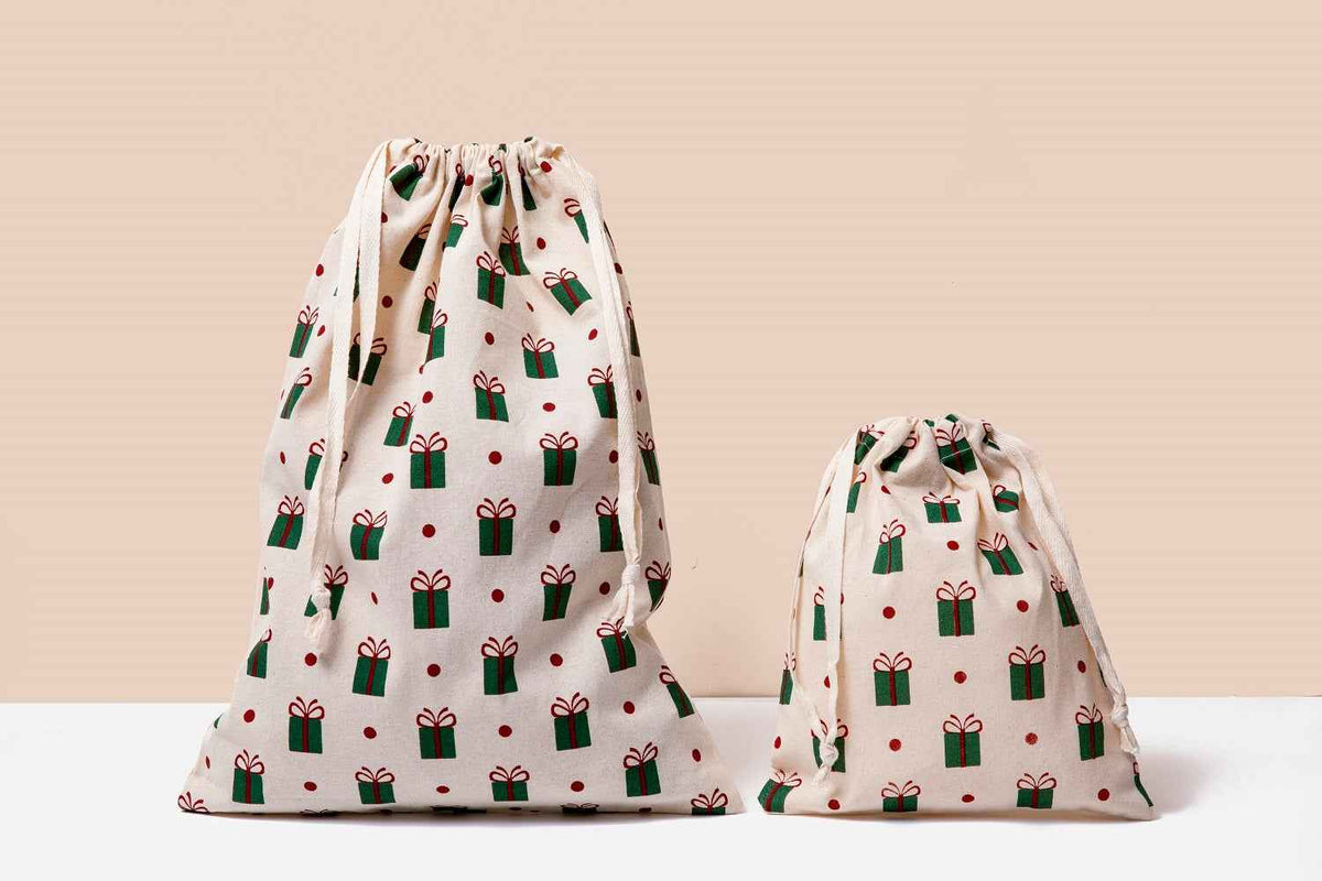Organic cotton drawstring bags with gift icon print, gathered drawstring tops