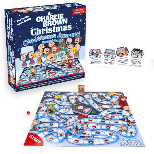 Christmas-themed Peanuts board game box with illustrated board layout and character art